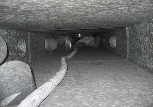 For duct cleaning requiring confined-space entry, MG Remediation, Inc. requires three people minimum: one in the confined space, and two outside to watch and for a potential rescue.